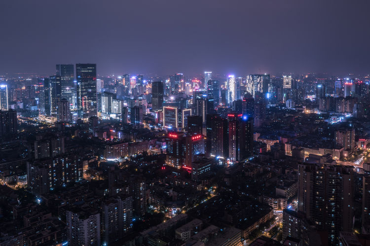 Illuminated cityscape at night