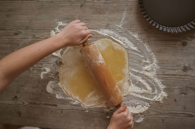 High angle view of woman making pastry