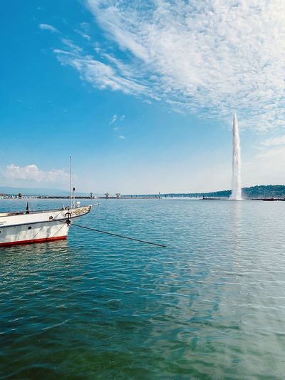 Sailboat on sea against sky