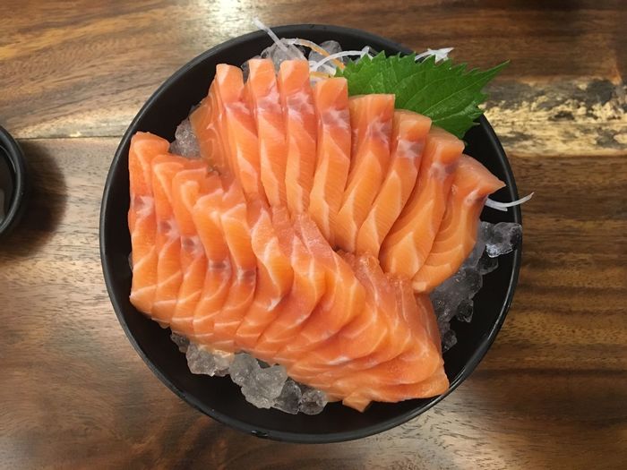 High angle view of fish in plate on table