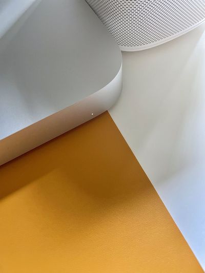 High angle view of a mac mini and mouse pad