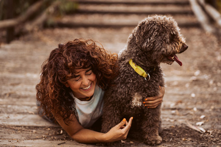 Portrait of woman with dog