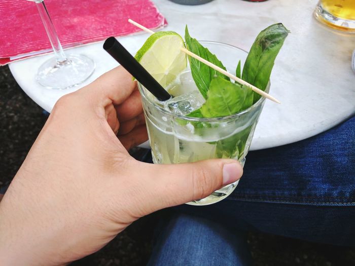 Close-up of hand holding moscow mule cocktail