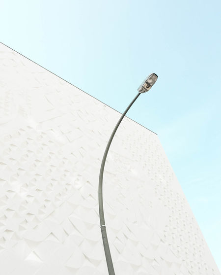 CLOSE-UP OF CABLE AGAINST SKY