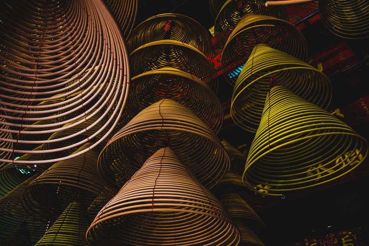 Low angle view of incense stick hanging