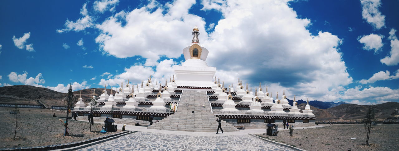 Big tibetan stupa against cloudy sky