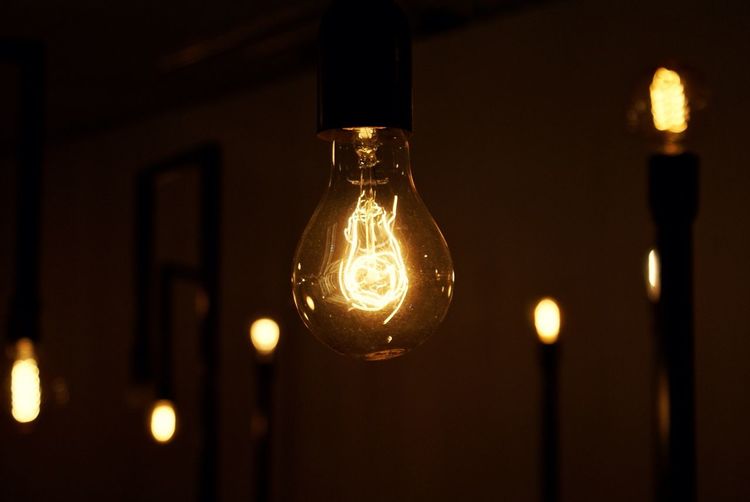 Close-up of lit up light bulb