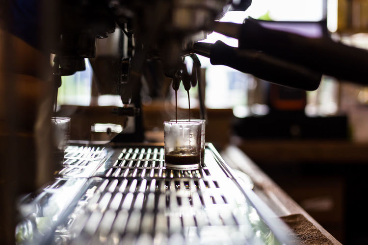 Close-up of espresso maker at cafe