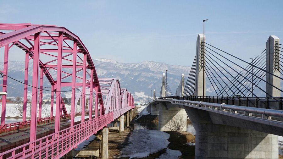 Bridges against sky during winter