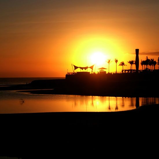 Scenic view of sea at sunset