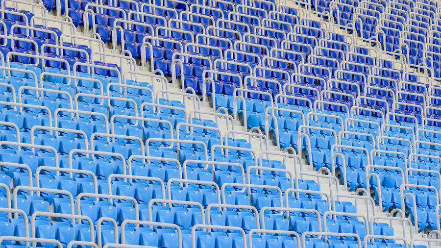 Full frame shot of empty chairs in stadium