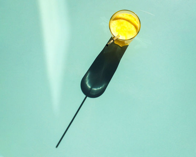 High angle view of drink on blue background