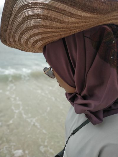 Close-up of woman standing on beach