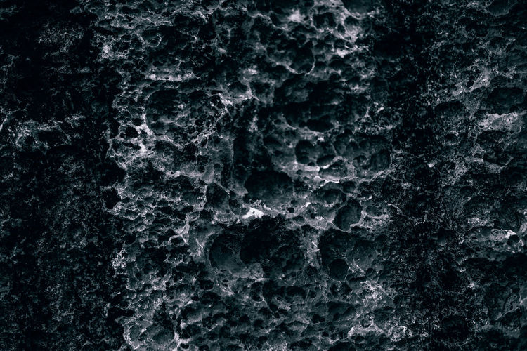 Full frame shot of black and white rock