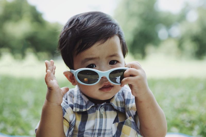 Portrait of funny boy wearing sunglasses
