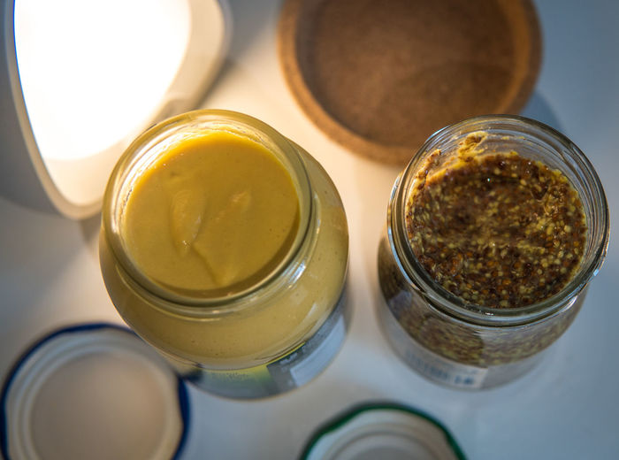 High angle view of beer in jar on table