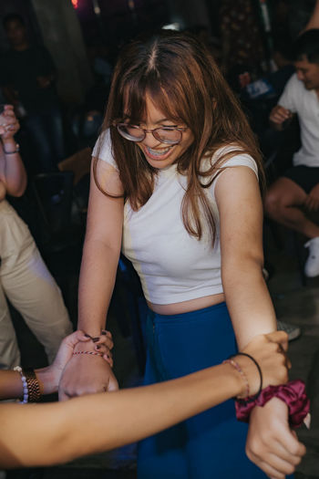 Portrait of young woman dancing on the dance floor