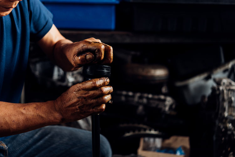 Mechanic repairing car 