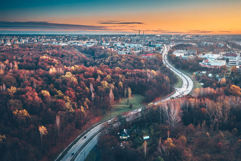 Aerial view of city during sunset during autumn