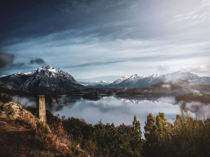 Scenic view of snowcapped mountains against sky