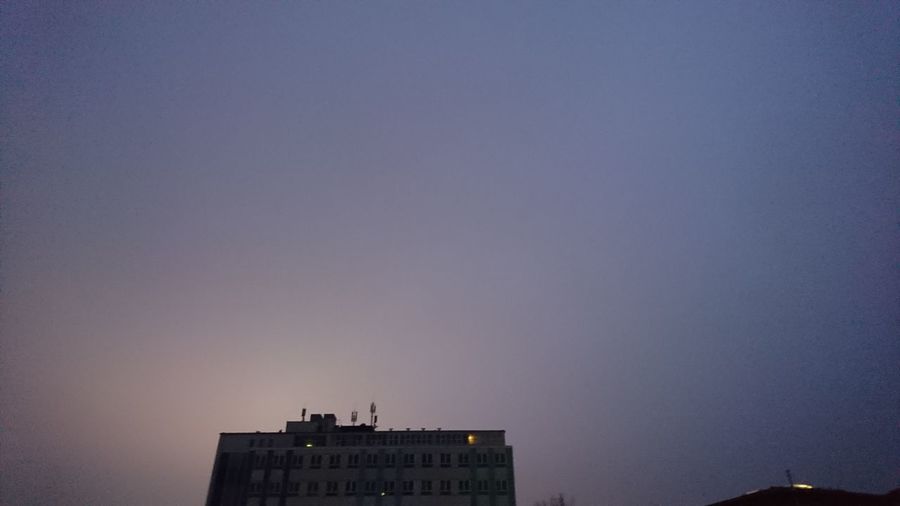 View of cityscape against clear sky