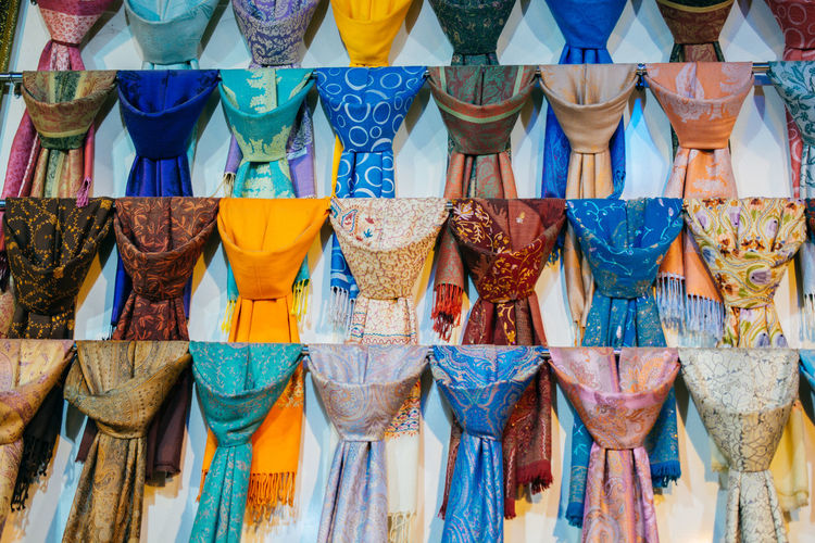 Close-up of multi colored scarfs for sale in market