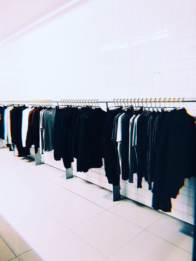 Panoramic view of clothes hanging at rack