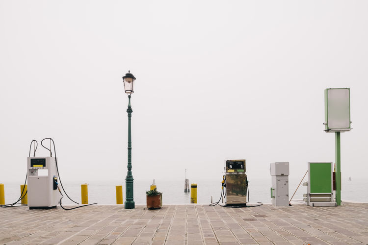 Gasoline on promenade against sky