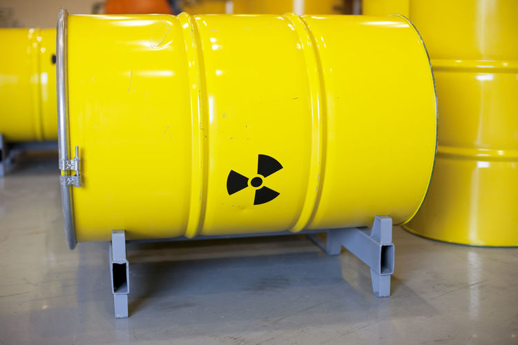 Close-up of radioactive barrels