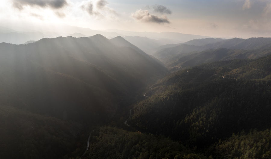 Scenic view of mountains against sky during sunset