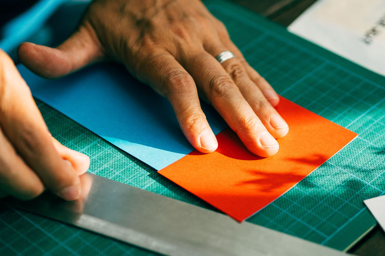 Cropped image of man working at table