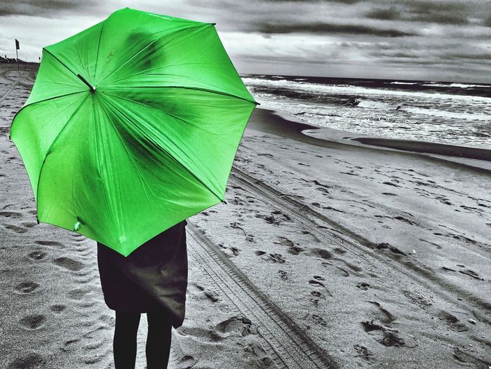 Low section of person on beach