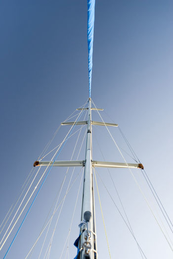 Low angle view of mast against clear sky