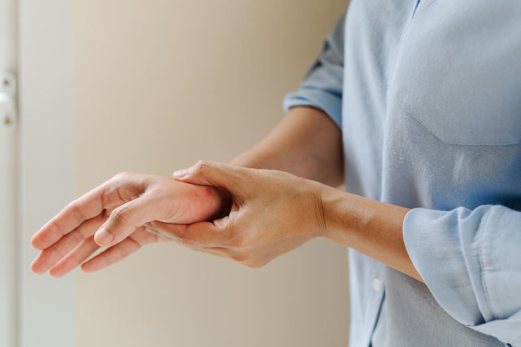 Woman wrist arm pain long working. office syndrome healthcare an