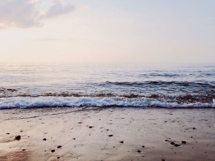 Scenic view of sea at sunset