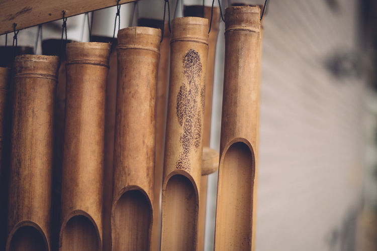 Close-up of wooden wind chime 