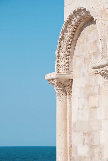 Detail of arch of trani churc in italy