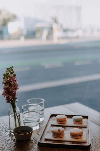 Flower vase on table against blurred background