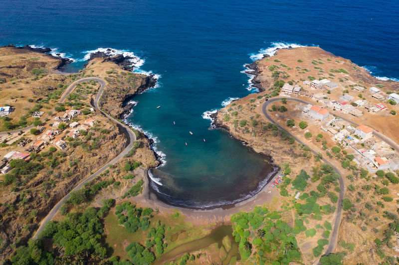 Aerial view of building by coastline