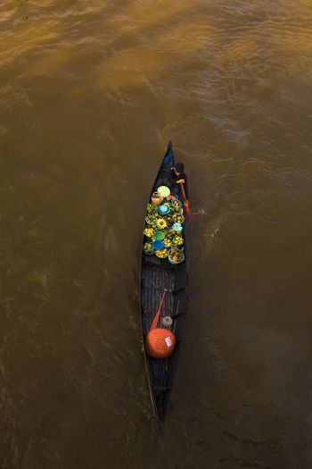 High angle view of man in boat on river