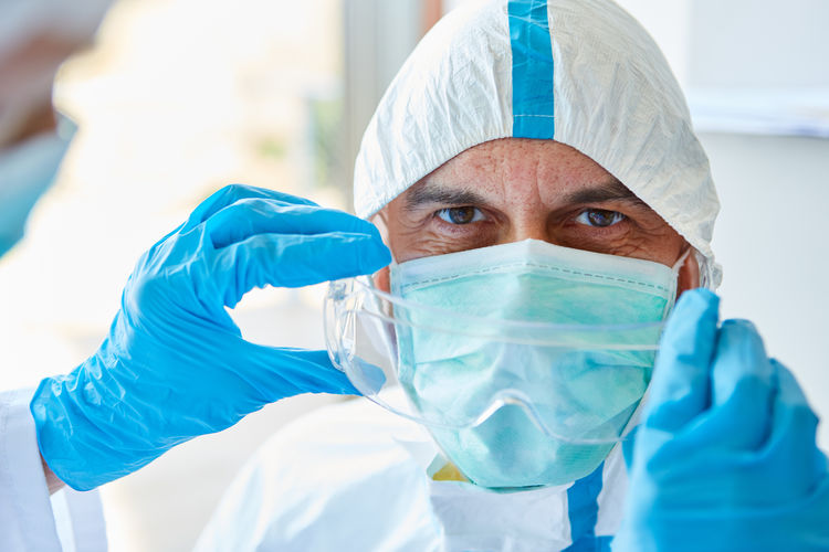 Portrait of doctor wearing mask at hospital