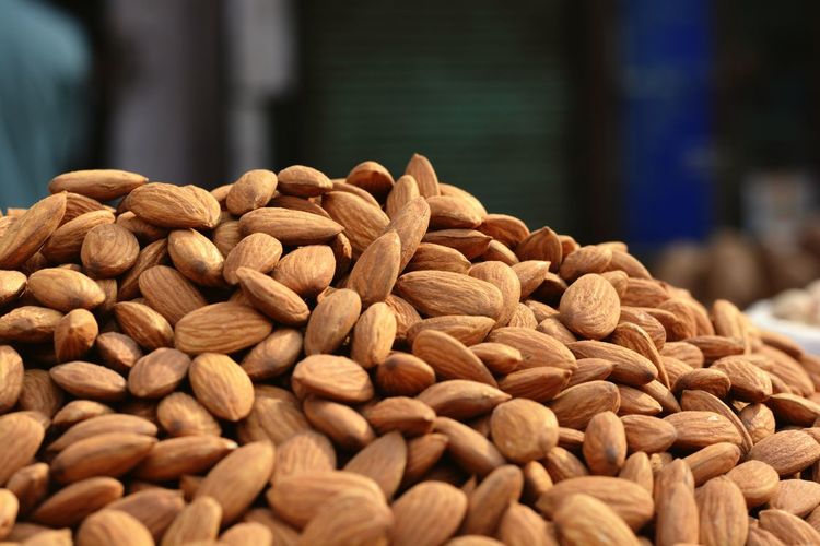Heap of almonds at market stall