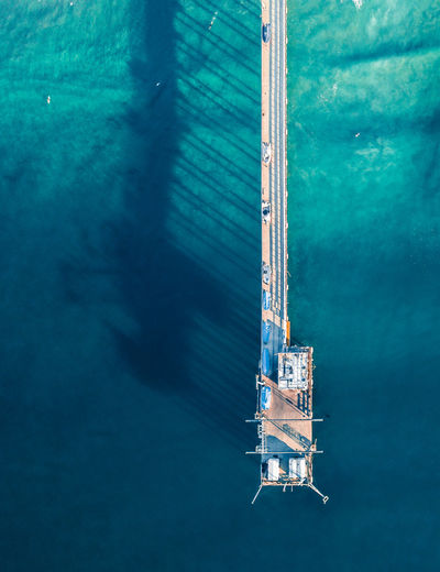 High angle view of sailboat sailing on swimming pool