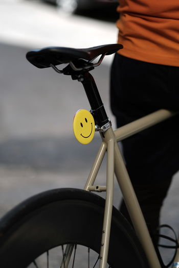 Close-up of bicycle against blurred background