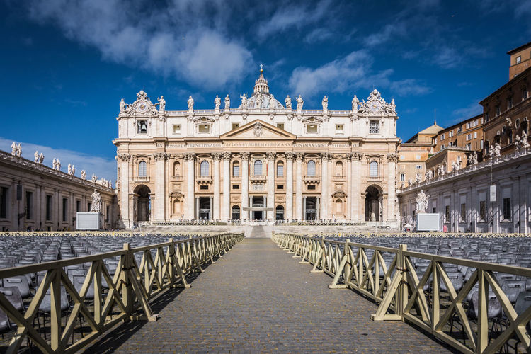 View of saint peter basilica in rome against cloudy sky