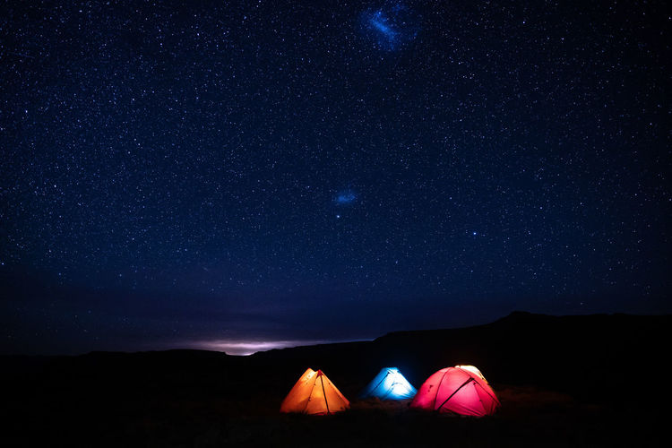 Low angle view of star field against sky at night in drakensberg, south africa.
