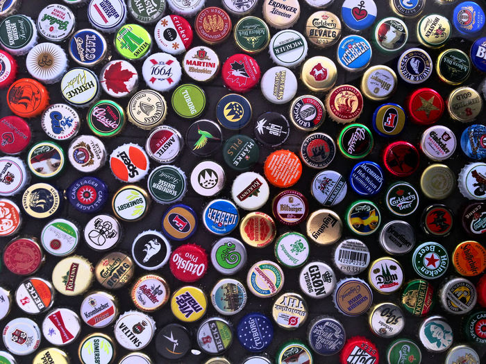 Full frame shot of multi colored bottle caps