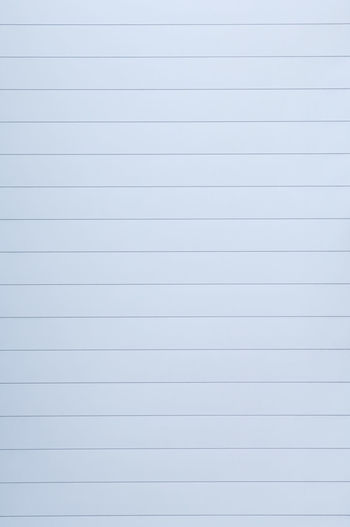 Close-up of paper against white background