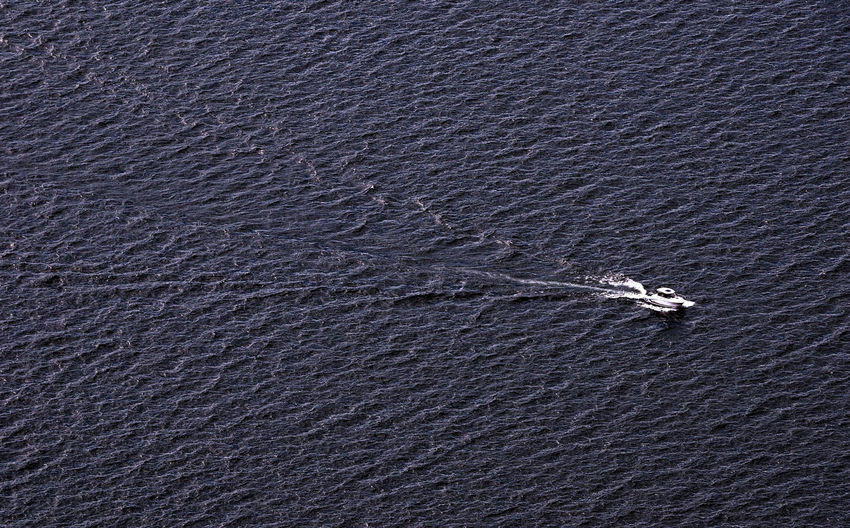 High angle view of boat moving in sea