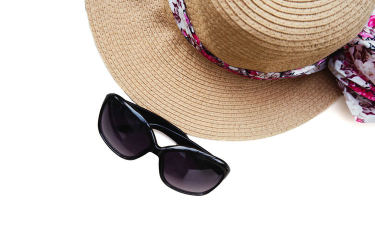 Close-up of sunglasses on hat